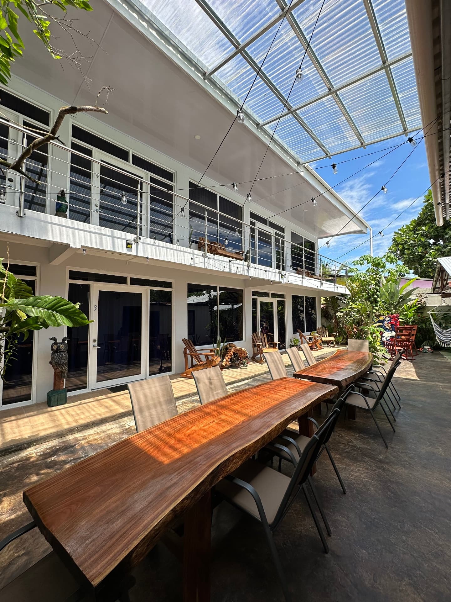 Sunny terrace dining area at Hotel Serendipity